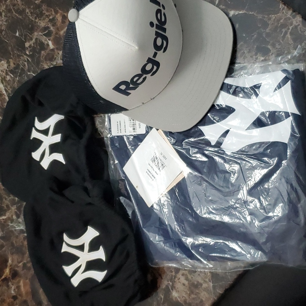 New york Yankees bundle .Reggie Jackson tshirt/hat and two headrest covers.